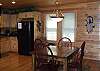 The Dining Room table provides seating for 4 and there are 3 stools at the bar for extra seating.