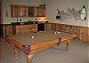 Enjoy a game of pool in the family room, also has bar area for your refreshments.  Access the Hot Tub deck from this room of the cabin.