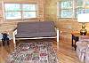 The Futon in the loft area provides extra sleeping or just a place for some quiet time reading or using the High Speed DSL provided.