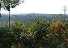 Enjoy Long Range Mountain Views while relaxing on the front porch of the cabin.