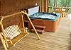 The Lower Deck has a 6 person Hot Tub and Porch Swing for your relaxation
