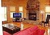 Living room is centered around the Gas Log Fireplace, Flatscreen LCD TV with DVD player and a few select DVD's
Stereo CD and FM Radio