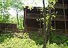 From the Creekside view of the cabin you can see the covered  Hot Tub deck located off the lower deck of the cabin.