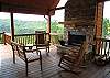 Rock your cares away by the Woodburning Fireplace on the Covered Porch.