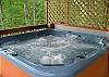Hot Tub has it's own private covered deck with privacy lattice