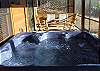 Relax and enjoy the privacy on the screened patio and the view of the Mountains from the  hot tub. This Hot Tub seats 5 comfortably so you and your mate can enjoy or invite your friends to join you there will be plenty of room.