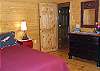 The master bedroom is located on the main floor and offers a Queen Bed.