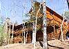 From this angle of the cabin you can see the many levels of decks and covered porches for you to enjoy during your stay.