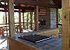 Prepare your favorite meal on the Electric Grill with small refrigerator in the outdoor grilling area. Then relax by the wood burning fireplace.