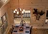This is the dining room area looking down from the balcony.