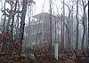 As the fog settles on the mountain it embraces this beautiful cabin.
