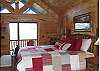 This Gorgeous Master Suite has cathedral ceilings with access to a private deck with adjoining Master Bath with Jacuzzi Tub.