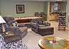 In the Lower Level of the Cabin is the Family Room with HDTV and DVD player, Pool Table, Wet Bar and Pub Table provides entertainment for the entire family