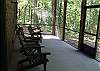 Enjoy a beautiful mountain view from the Screened Porch which also houses the Hot Tub .  Your children can also enjoy a nice area located out back to play and enjoy nature.
