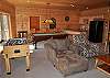 The game room offers plenty of room for you family to enjoy.  Pool table, Foosball Table and a dart board for your competitive family.  Wet Bar, Fireplace and Flatscreen TV.  Easy access out to the Hot Tub deck also.