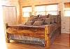 King Bed in the Upstairs bedroom. There is also a private bathroom for this bedroom.