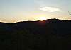Enjoy the sunset over the mountains from the decks of the cabin
