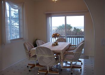 Dining Room With Sliding Door to Deck