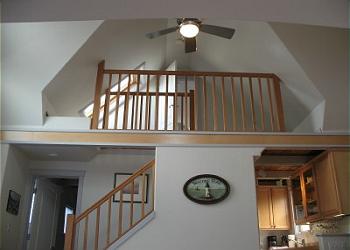 Looking up to private loft bedroom