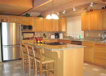 Modern Kitchen with Stainless Appliances & Granite Countertops!