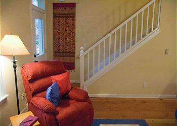 Living room to stairs.