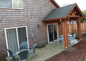 Fully fenced back yard with patio
