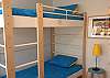 Second set of bunk beds in downstairs bunk room.