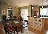 Granite Counter Tops + Stainless Steel Appliances in Great Room  ...  Open Door to Media Room with Sleeper Sofa  ...  Glass Doors to BBQ Deck