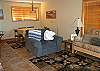 Second Living.Dining Area ... Use this table for games and puzzles ... Couch doubles as futon sleeper ...