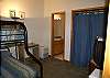Twin up, double down, full bath and TV entertainment on ground level.