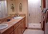 Spa shower with dual shower heads and a skylight!