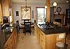 Granite countertops, gorgeous cabinets, and that floor is the heat source. It's radiant!