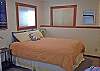 Queen Bed Shares Room with Futon.  Accordian Door Separates Queen Bed from Futon.