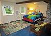 New lower level queen bedroom.  Windows to ocean view.  New attached bathroom.  Also access to laundry room.