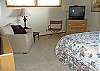 Chair, Reading Lamp, and TV