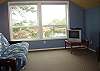 Second Floor. TV Room with Queen Futon. Used as Bedroom.  Sink in Room.