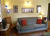 Living room, notice flat screen TV.