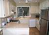 Updated kitchen in Lae Nani 114.  We're told the tile countertops will be replaced in 2012.