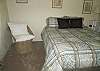 Light, airy queen bedroom