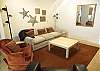 Downstairs Family Room + TV + Queen Sleeper Sofa