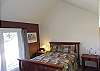 Downstairs master bedroom
Queen Size Bed
TV
Private Patio
