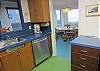 Revitalized kitchen-to dining-to views at Beach House at NKN.
