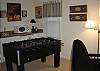  House rental - Interior Photo - Game Room and Wet Bar