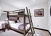 Lower level bunk room with queen over queen bunk bed. -  The Bogart House Breckenridge Vacation Rental 