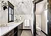 The master bathroom also offers dual vanity and a private toilet. -  The Bogart House Breckenridge Vacation Rental 