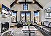 Warm by fireplace, take in the view or watch TV in this sleek living area -  The Bogart House Breckenridge Vacation Rental 