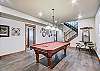 Enjoy a group game night with this lower level pool table and additional seating - Breck Escape Breckenridge Vacation Rental  