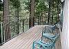 Enjoy the back deck with a view of the lake.