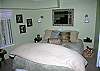Downstairs is a queen size bed, half bath, with a jetted tub in bedroom.  TV and Laundry downstairs as well.