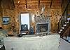 Living room has propane fireplace